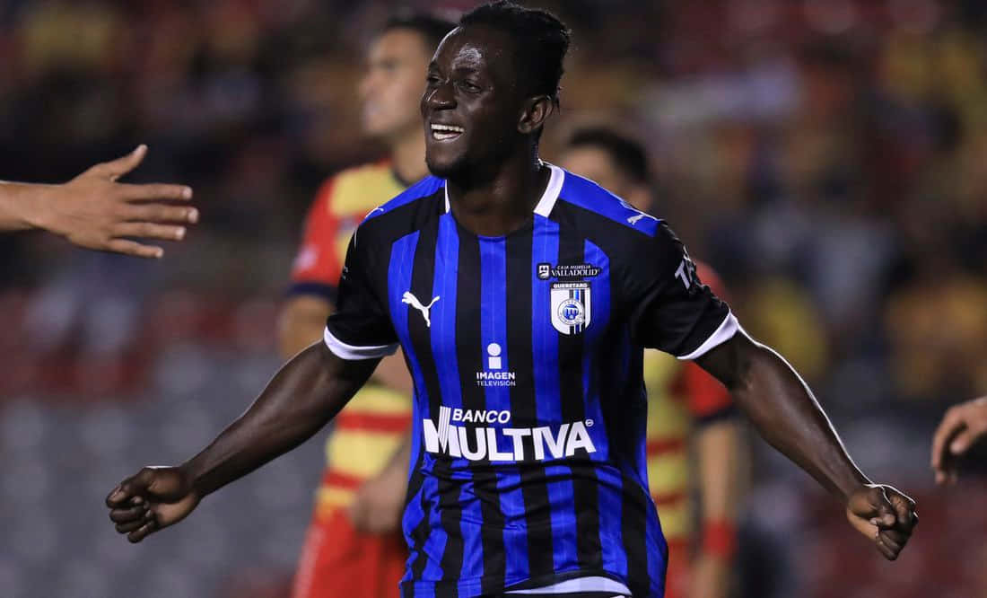 Soccer_ Player_ Celebration_ Moment.jpg Background