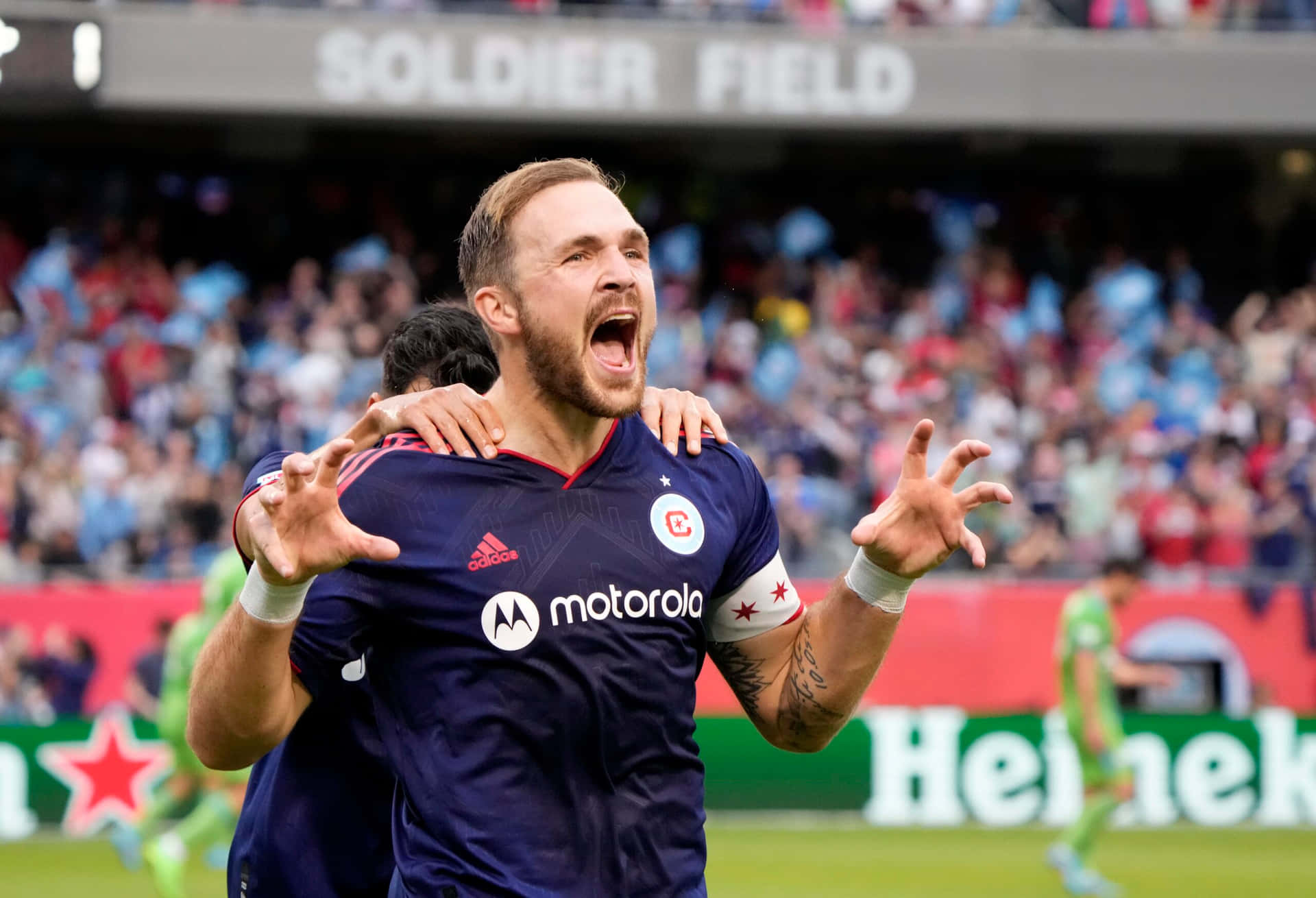 Soccer Player Celebrationat Stadium Background