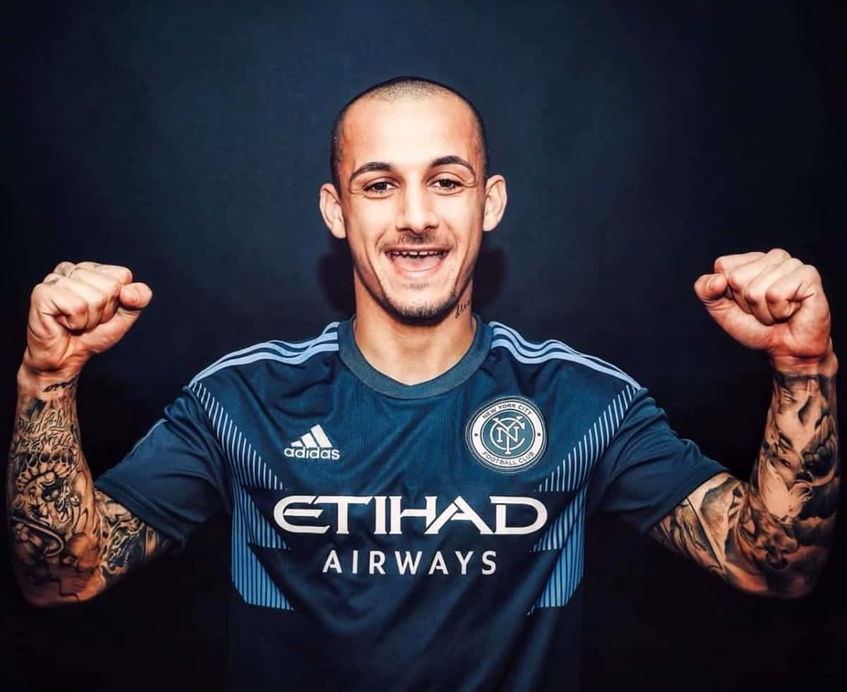 Soccer Player Celebratory Pose Background