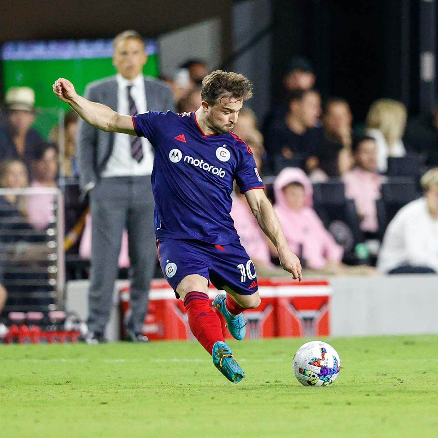 Soccer Player Control Ball During Match Background