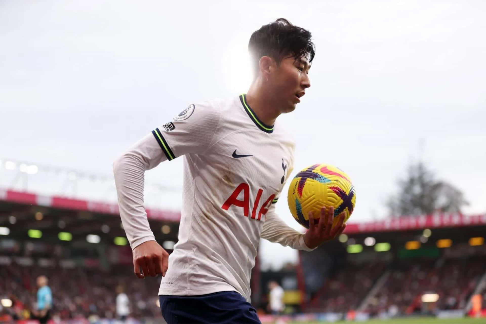 Soccer Player Controling Ball During Match