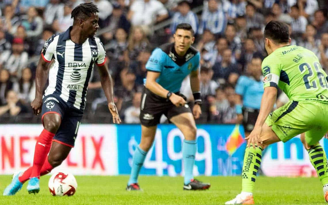 Soccer Player Controling Ball During Match Background