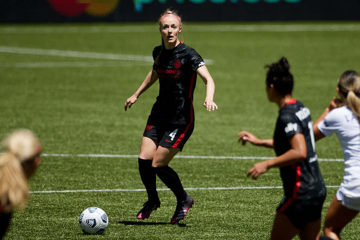 Soccer Player Controlling Ball During Match