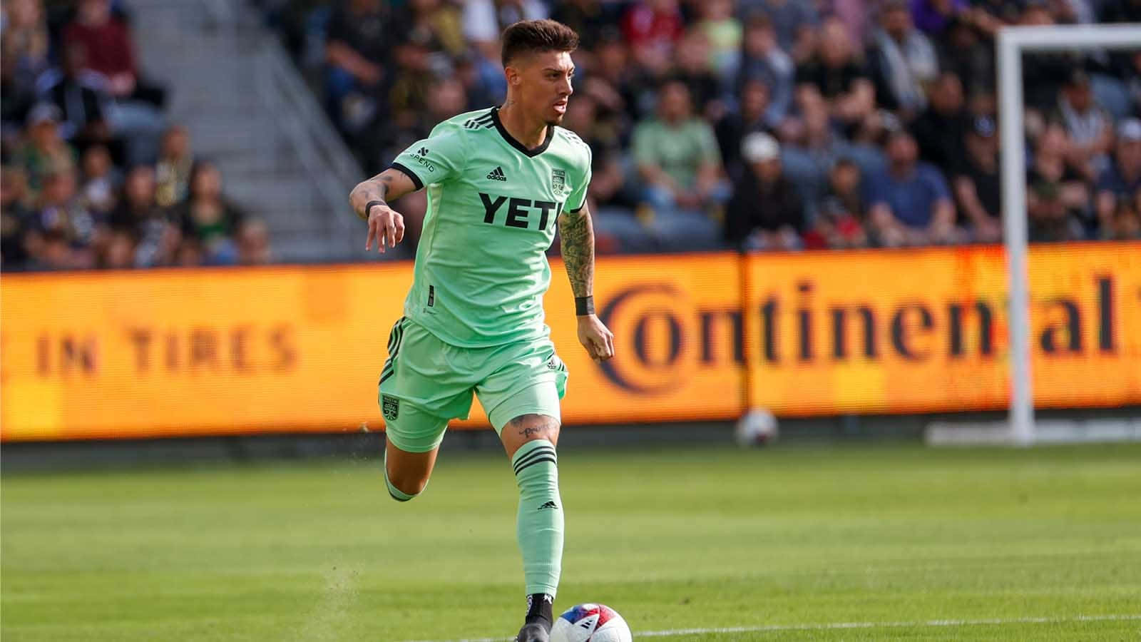 Soccer Player Emiliano Rigoniin Action Background