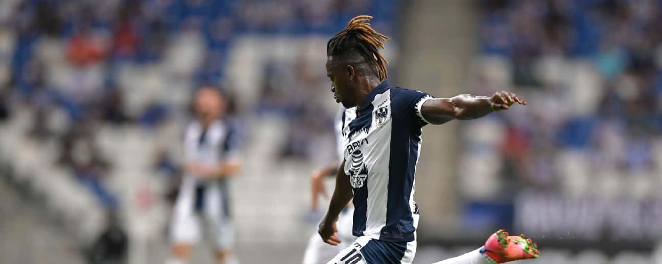 Soccer Player In Action During Match Background