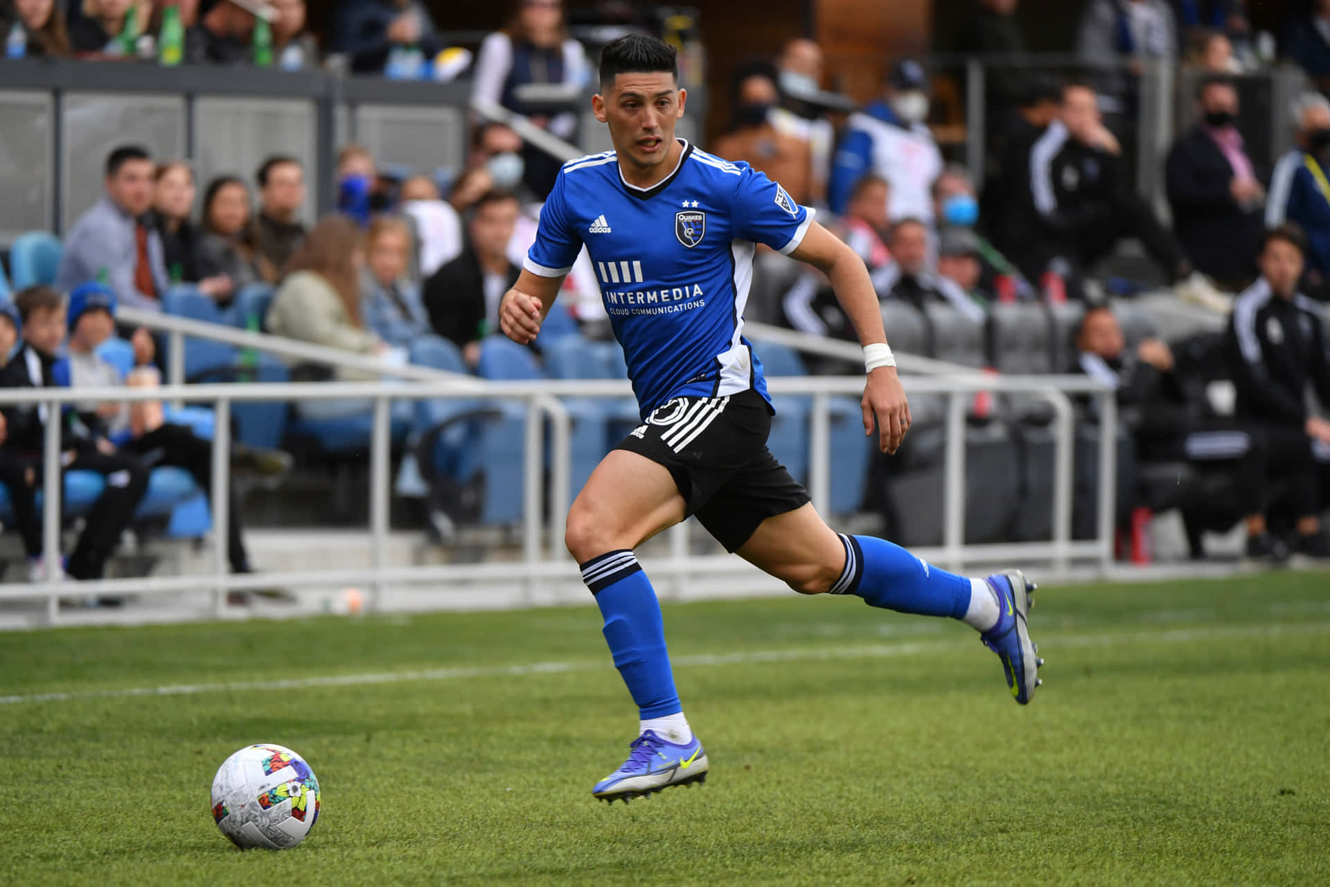 Soccer_ Player_in_ Action_on_ Field.jpg