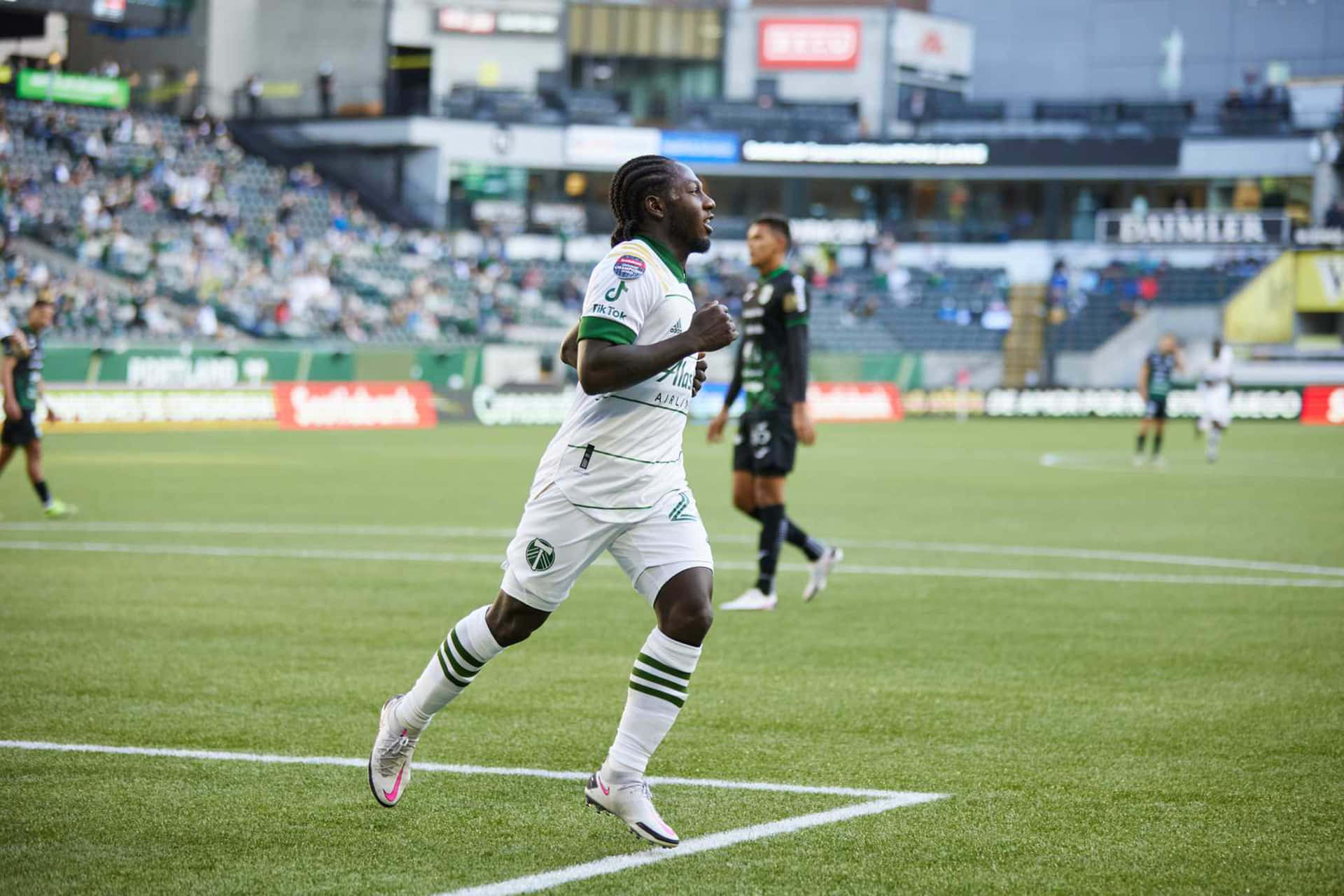 Soccer_ Player_in_ Action_on_ Field.jpg Background