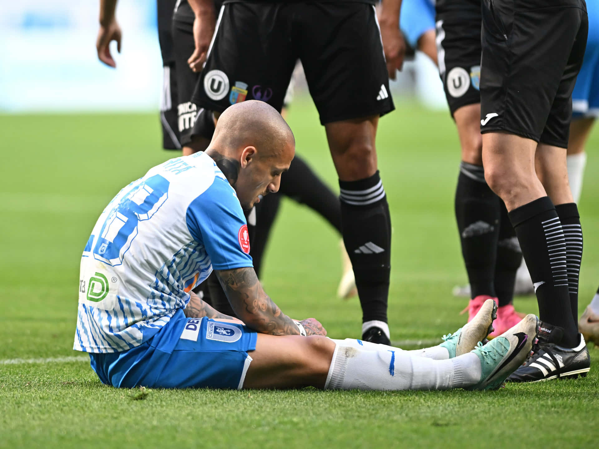 Soccer Player Injury Moment Background