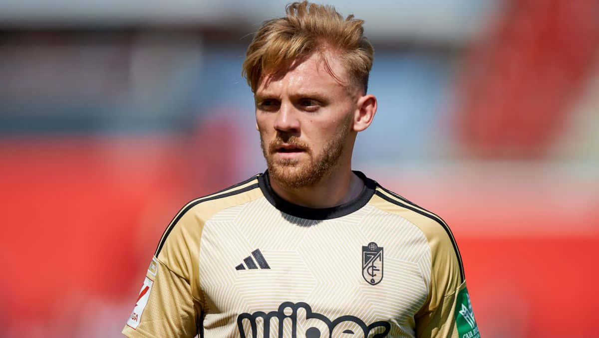 Soccer Player Kamil Jozwiak Background