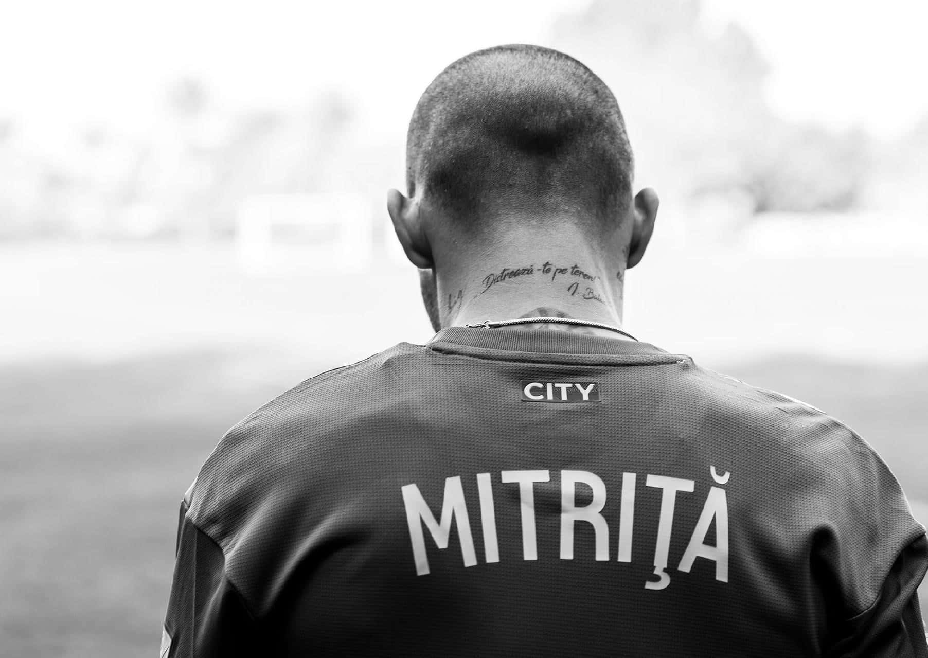 Soccer Player Mitrita Back View Background