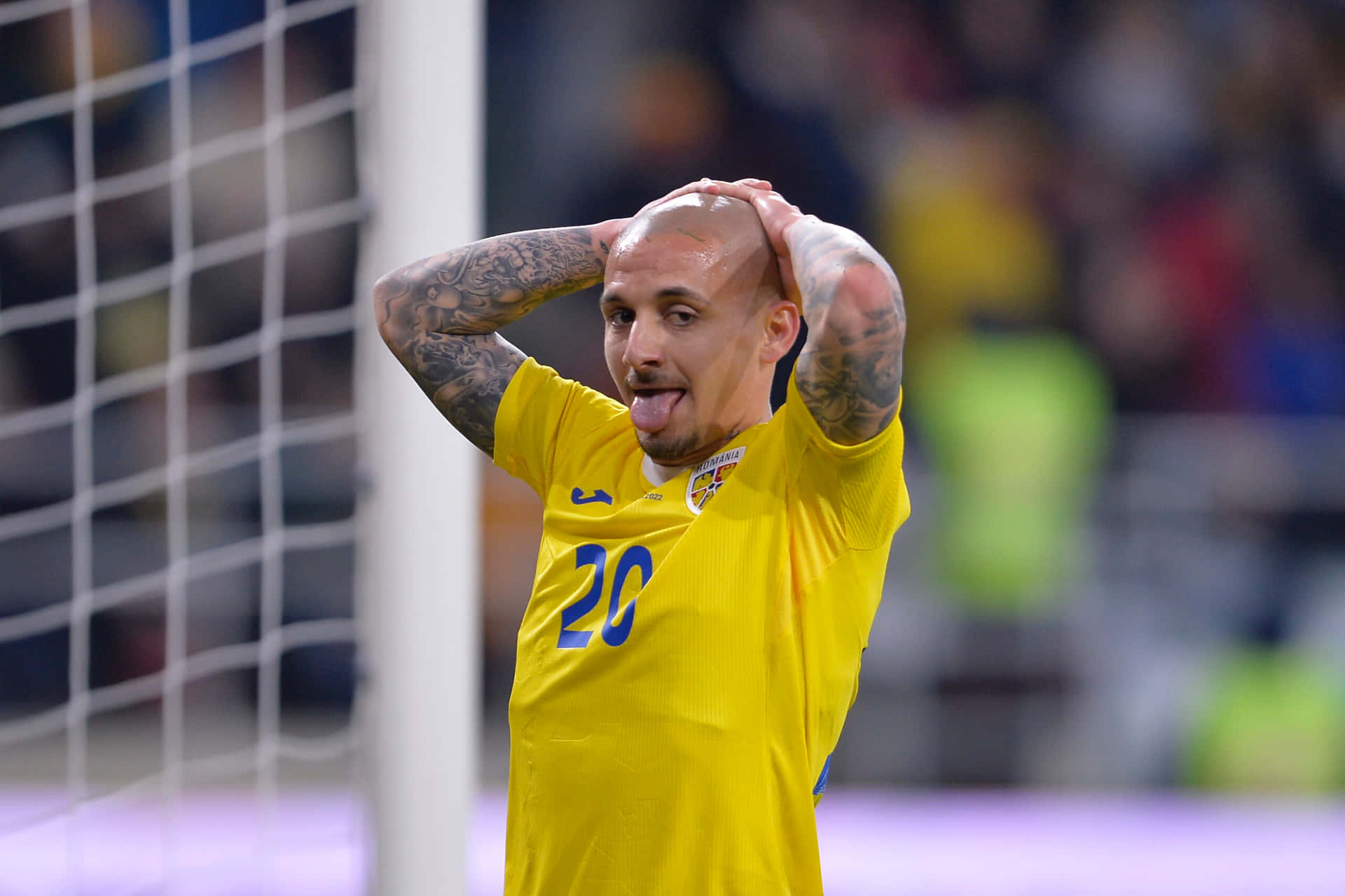 Soccer Player Reaction During Match Background