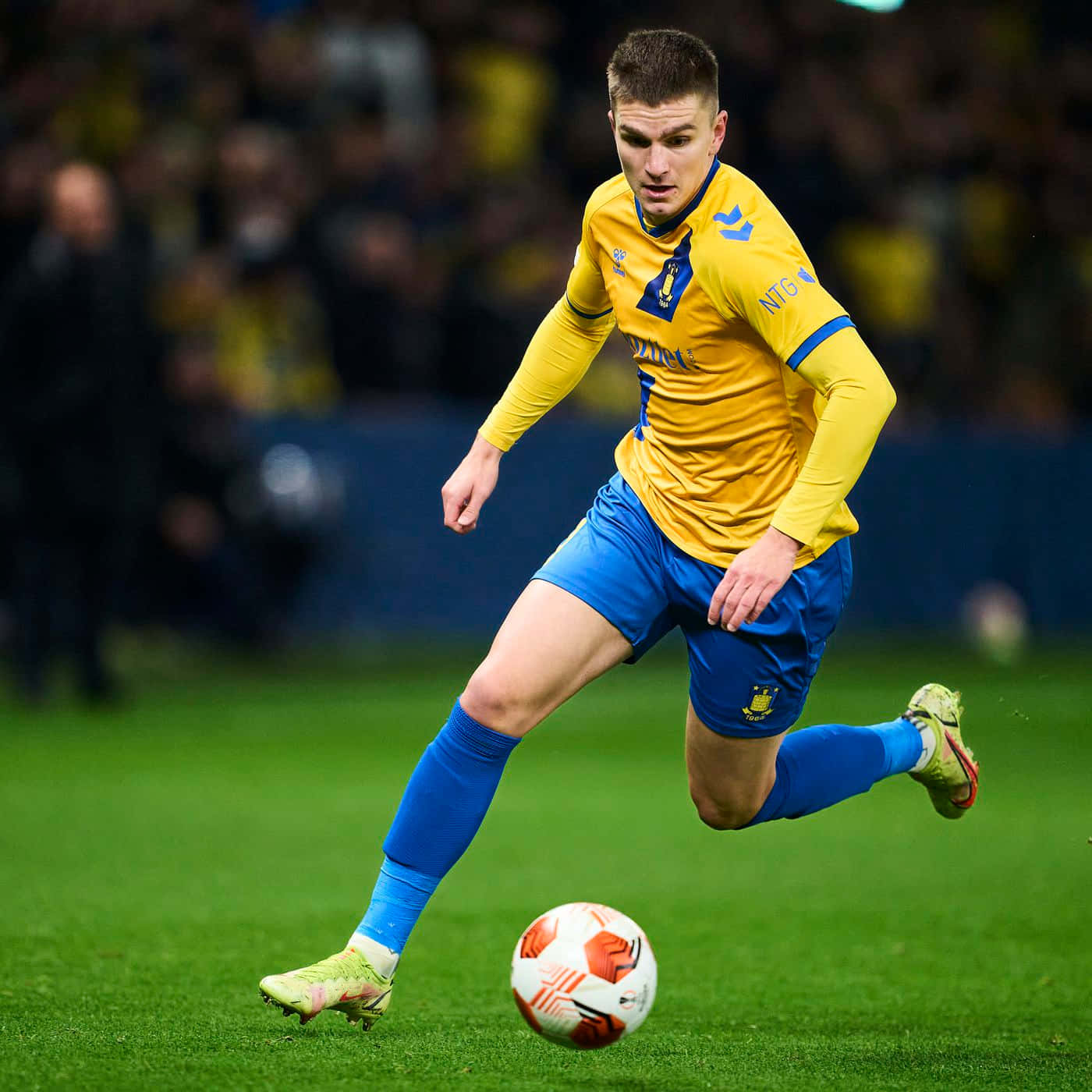 Soccer Playerin Action Dribbling Background