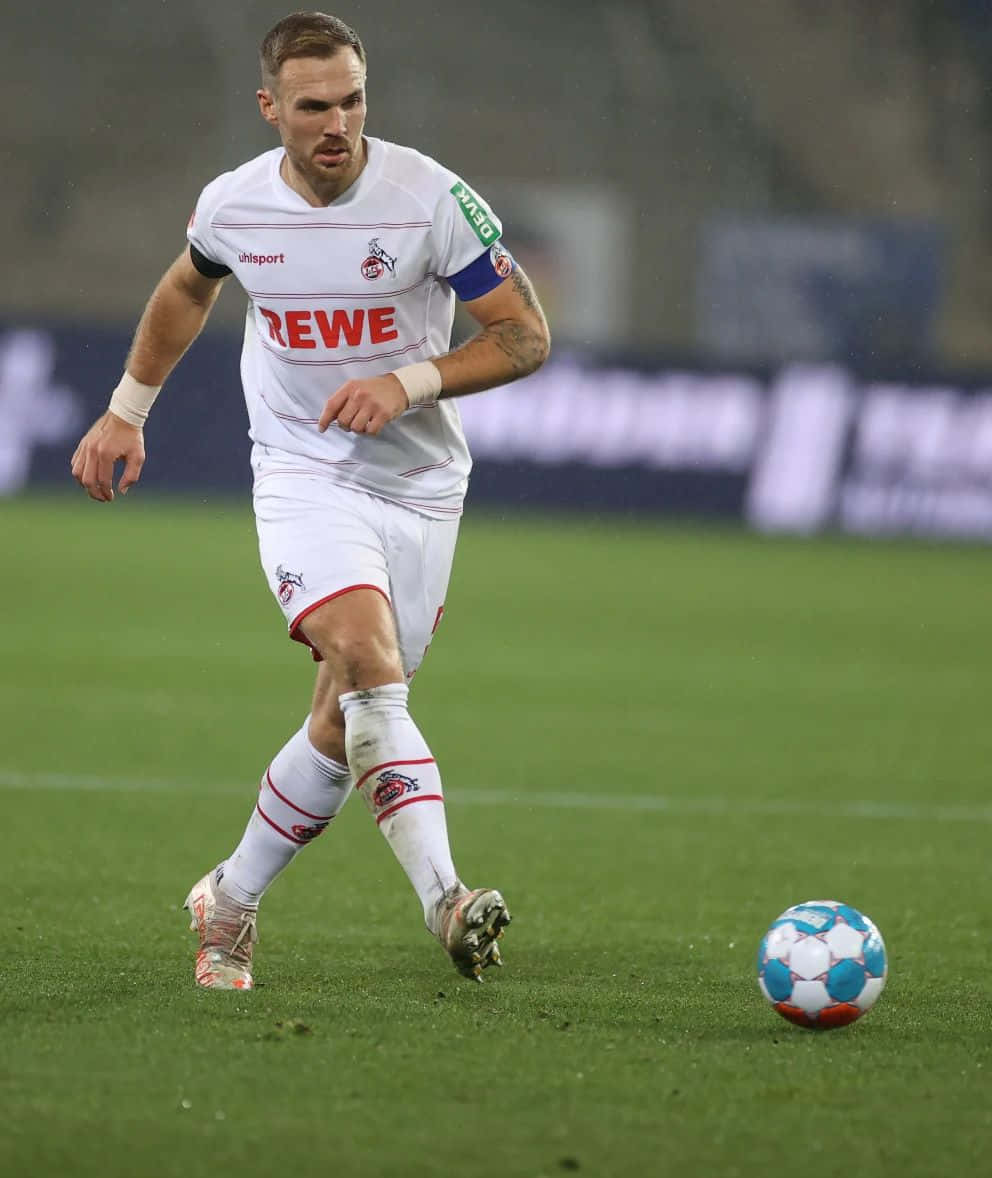 Soccer Playerin Actionon Field.jpg Background