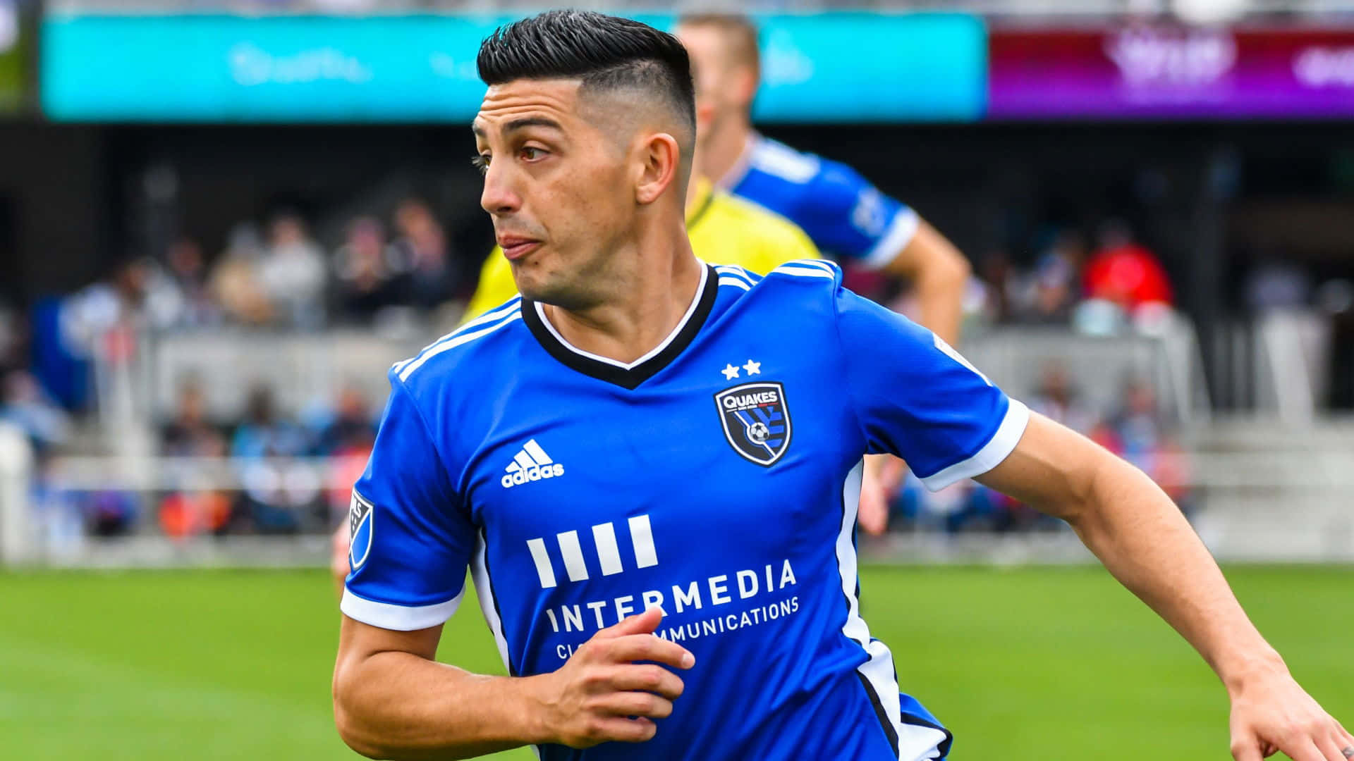 Soccer Playerin Blue Jersey Action Shot