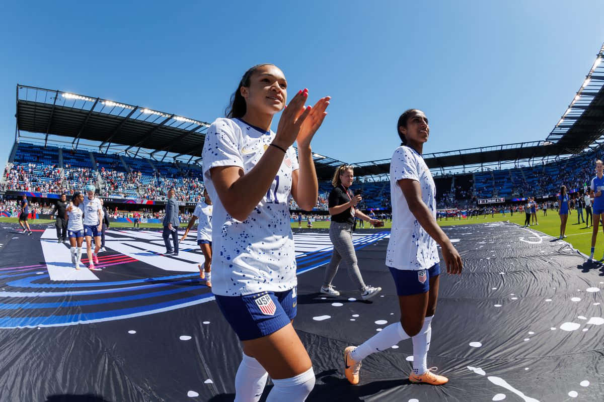 Soccer Players Entering Stadium Background