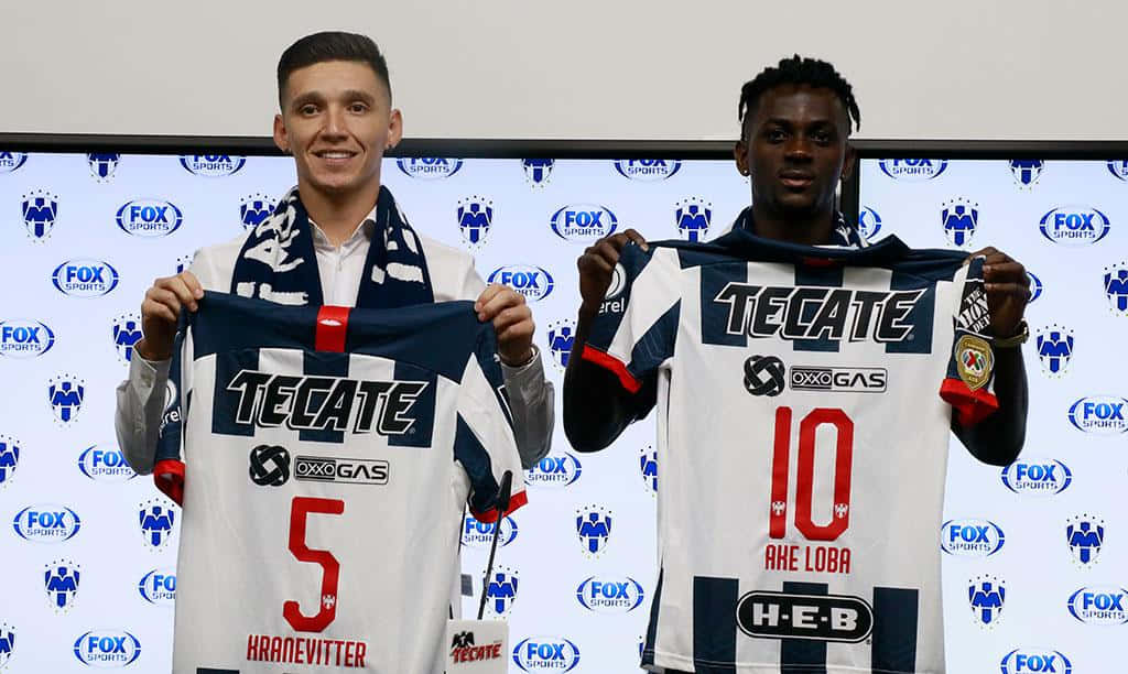 Soccer Players Presenting Jerseys Background