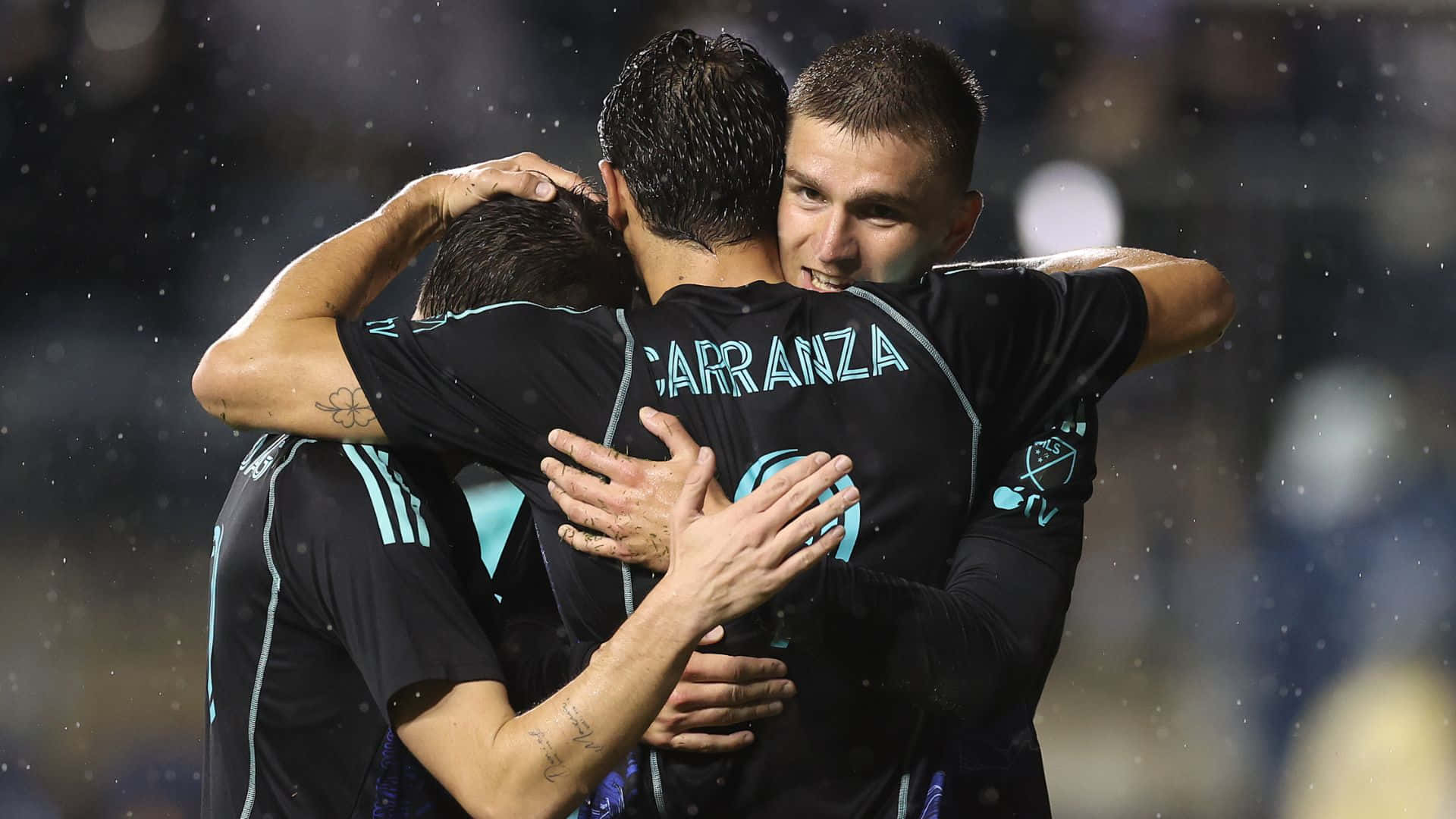 Soccer_ Team_ Celebration_in_ Rain.jpg Background