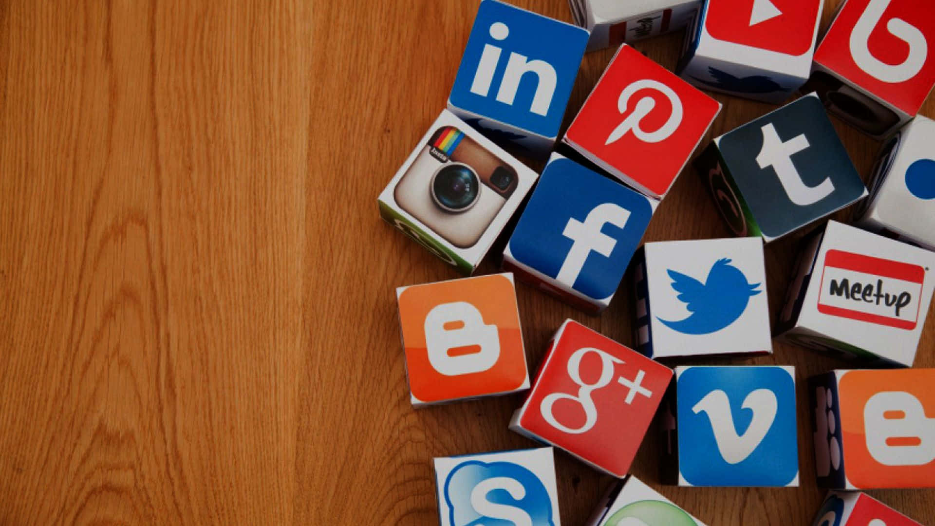 Social Media Apps Cubes On Wooden Surface Background