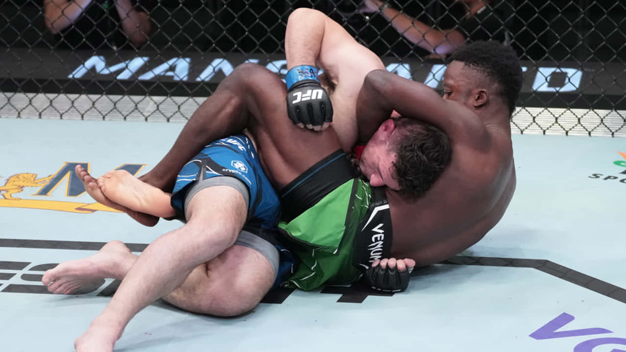 Sodiq Yusuff Locking Opponent