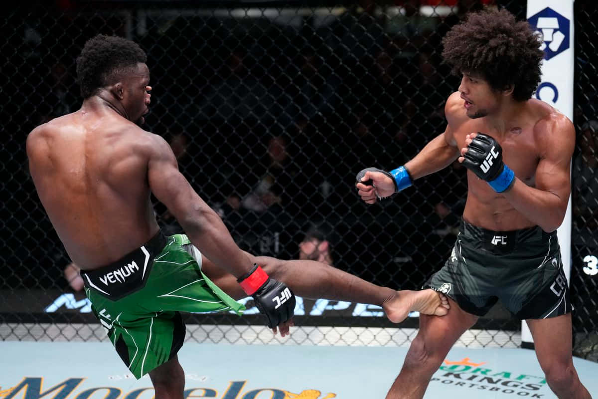 Sodiq Yusuff Low Kick Background