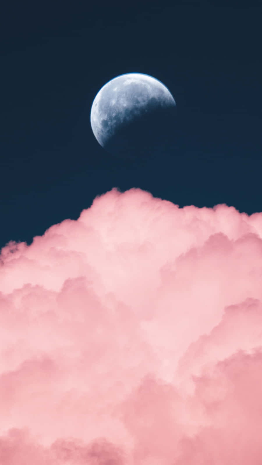 Soft And Dream-like: A Pastel Pink And Blue Aesthetic Wallpaper Background