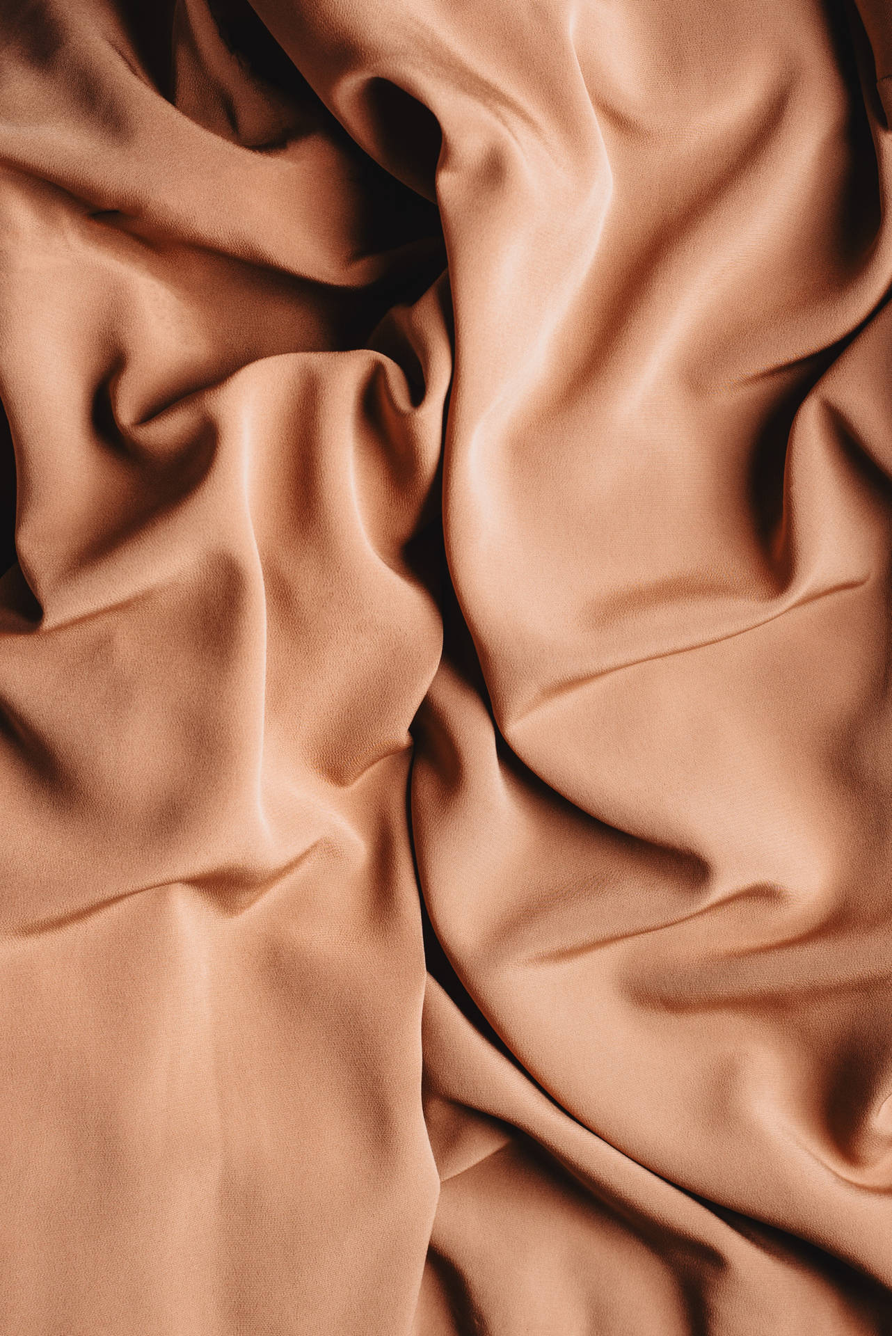 Soft Embrace Of Solid Pastel Brown Silk Background