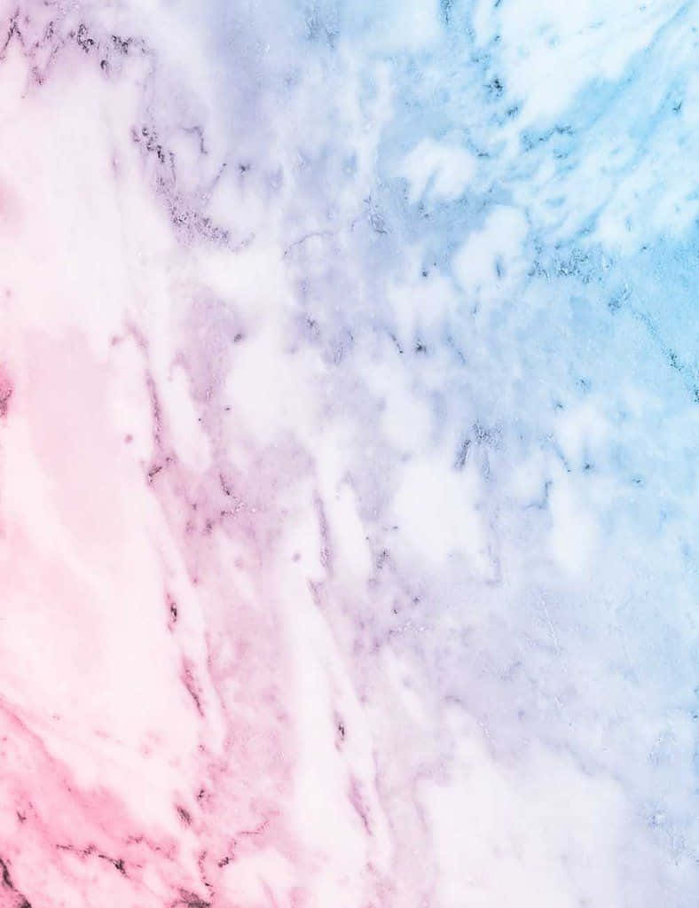 Soft Pastel Shades Of Blue And Pink Collide To Create A Calming Abstract Wallpaper.