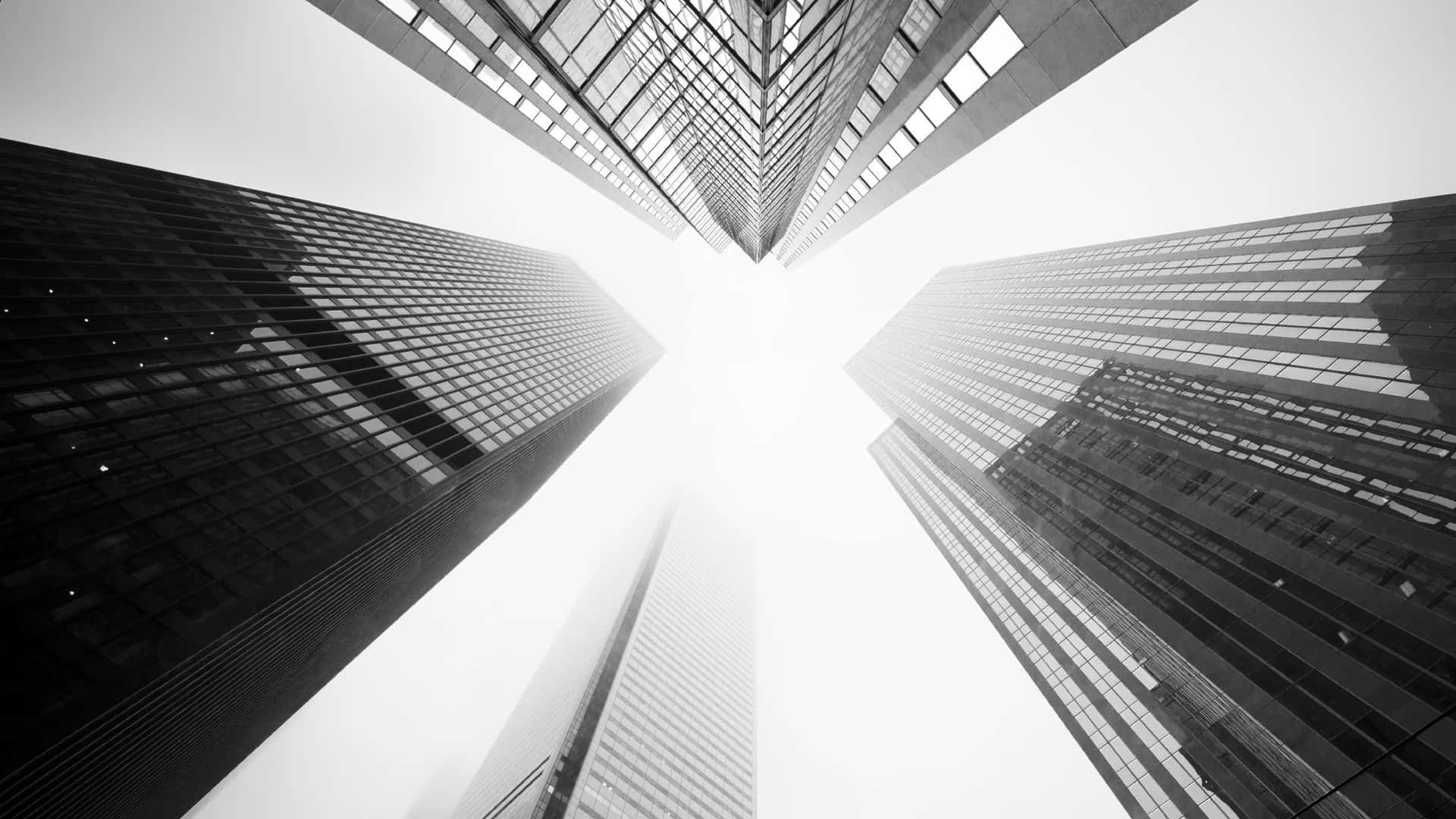 Soft White Aesthetic Sky Over Tall Skyscrapers Background