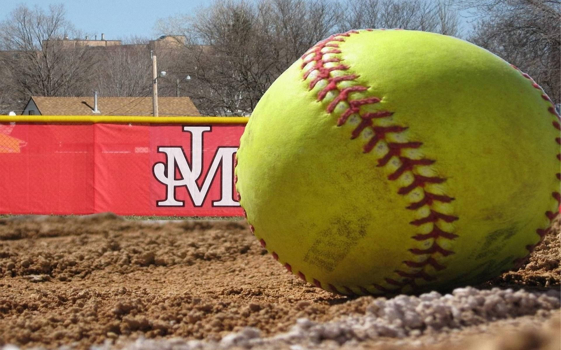 Softball In Familiar Neon Green Colour Background