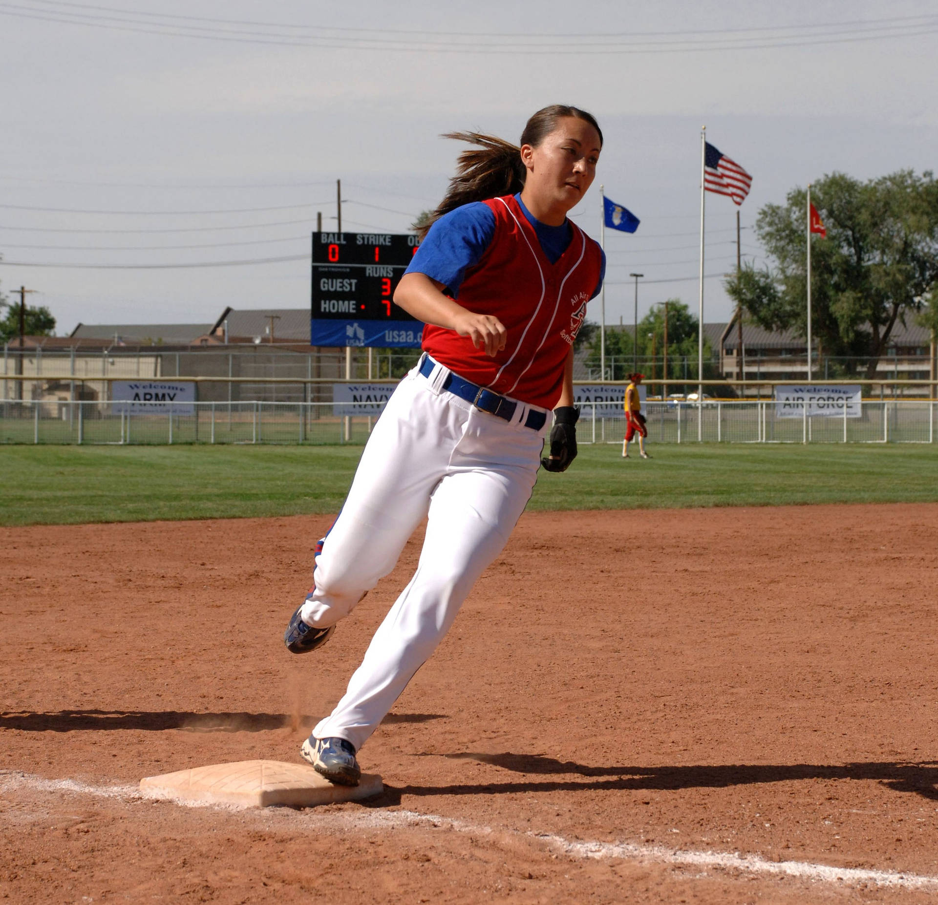 Softball Player Running On The Field Background