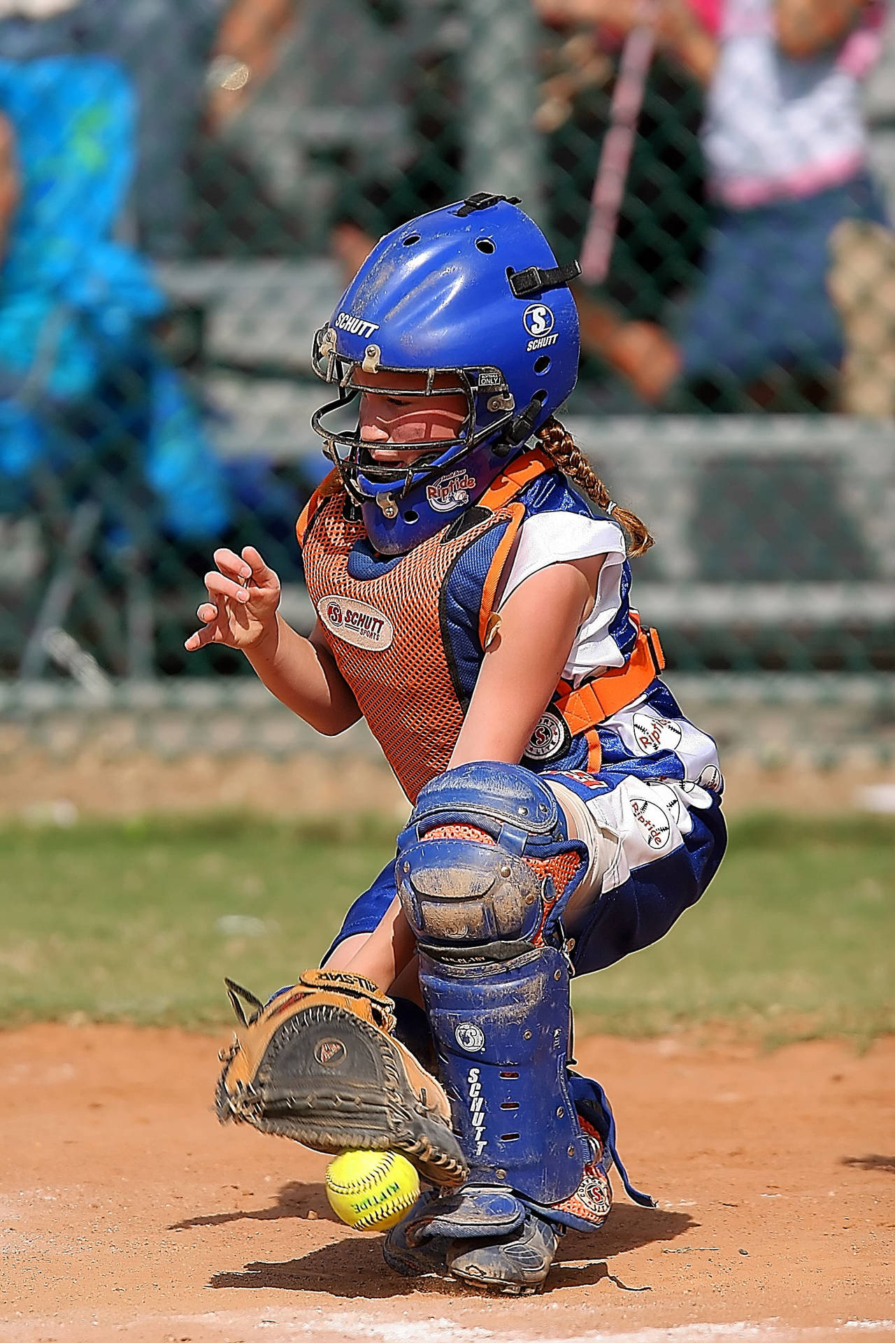 Softball Player With Dirt Covered Uniform Background