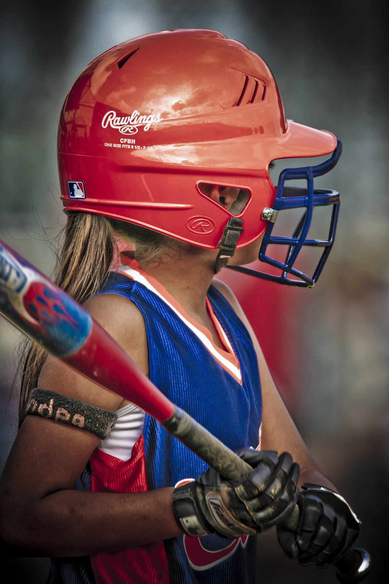 Softball Young Player With Bat Background