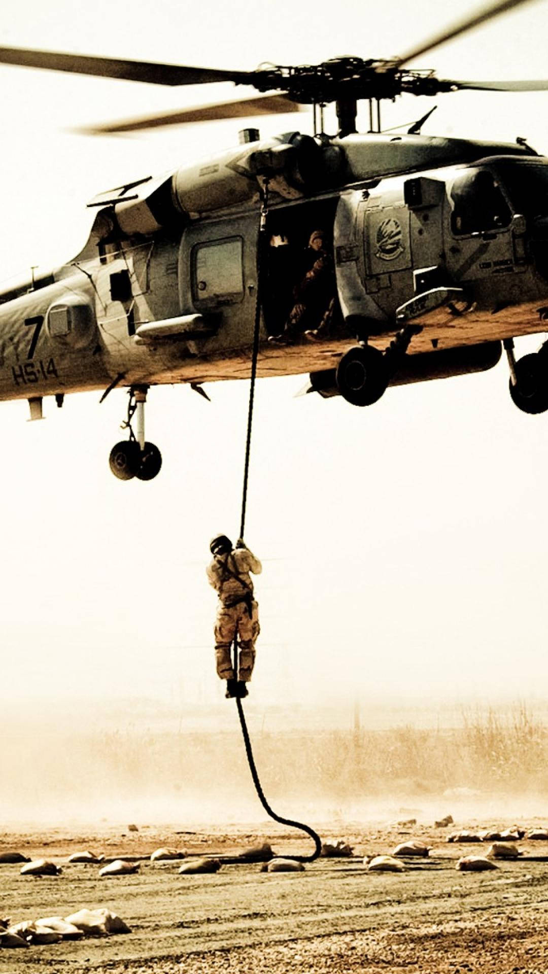 Soldier Suspends From Black Hawk Helicopter