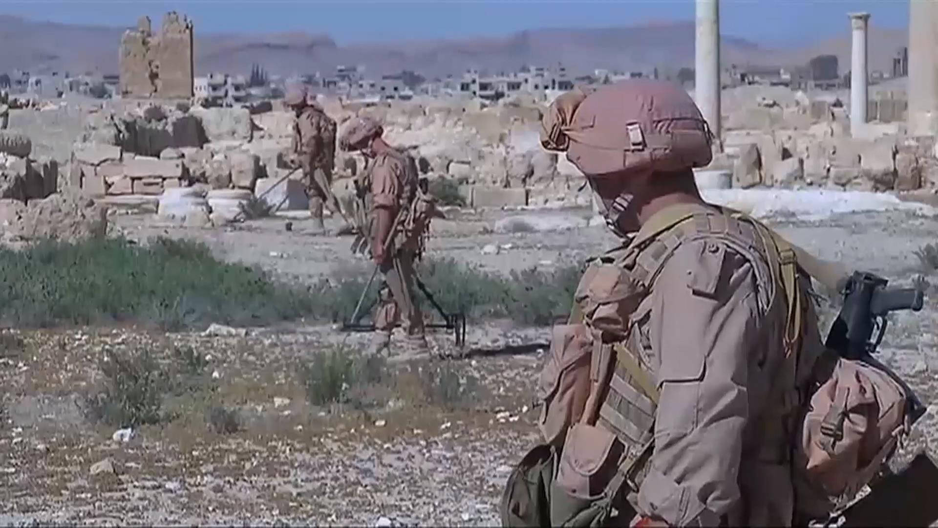 Soldiers In Palmyra Syria Background