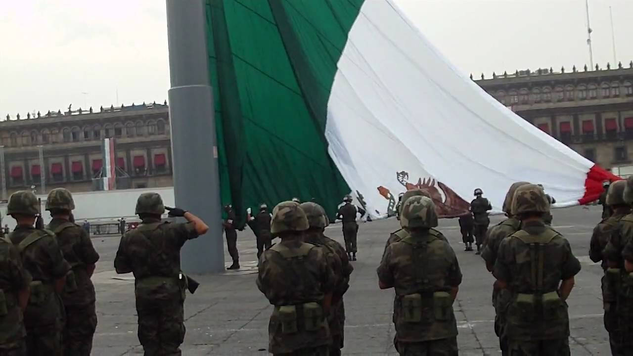 Soldiers Saluting Mexico Flag Background