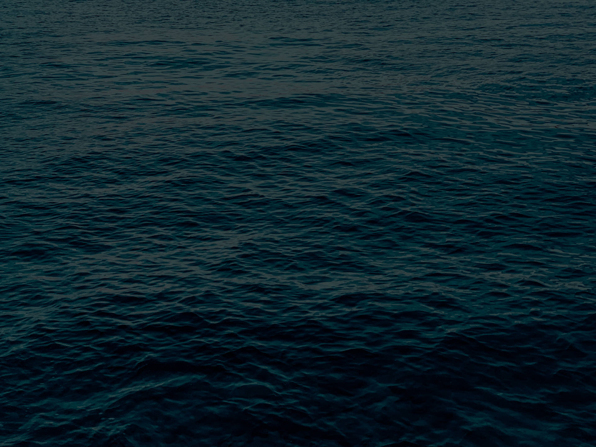 Solid Dark Blue Sea Surface Background