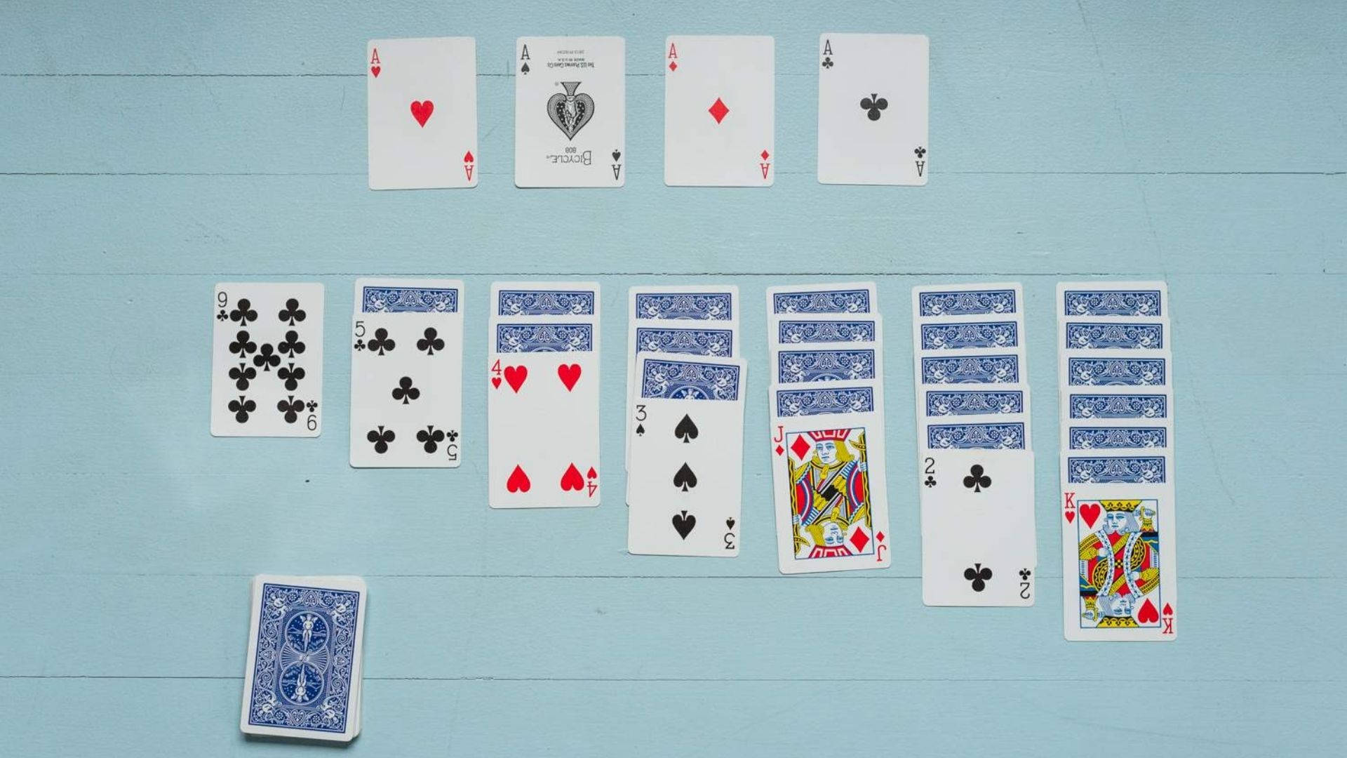 Solitaire On A Blue Backdrop Background