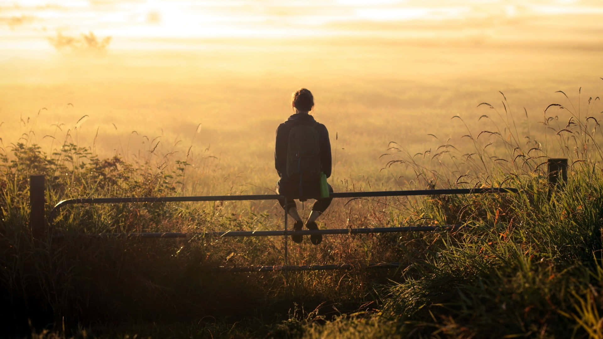 Solitary Man Sitting Down Background