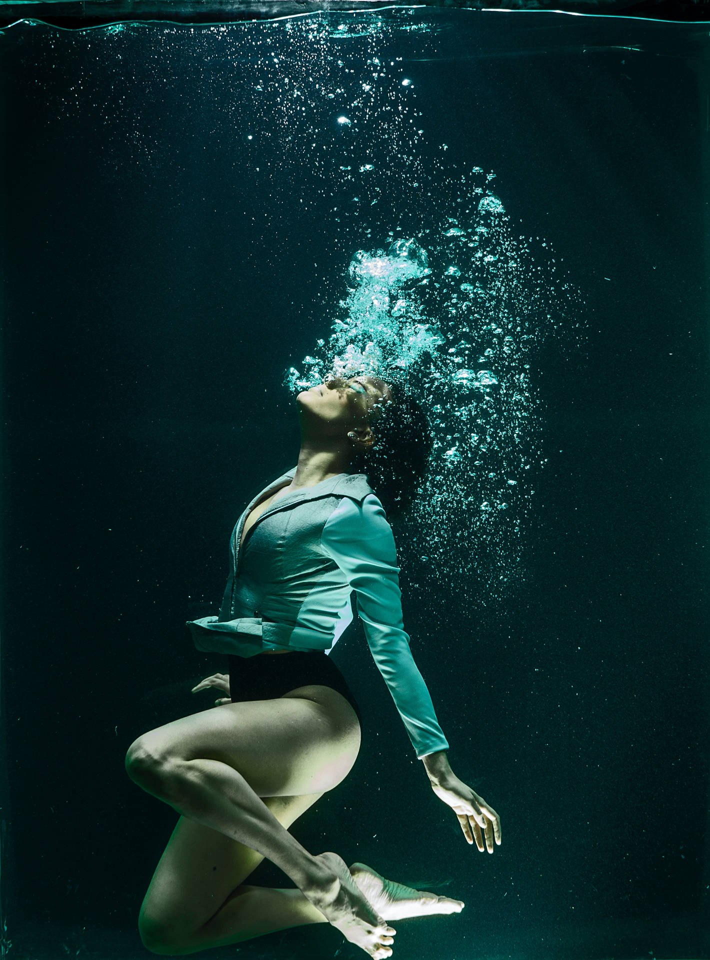 Solitude Underwater: Girl Embracing Her Solitude Under The Depth Of Blue Waters