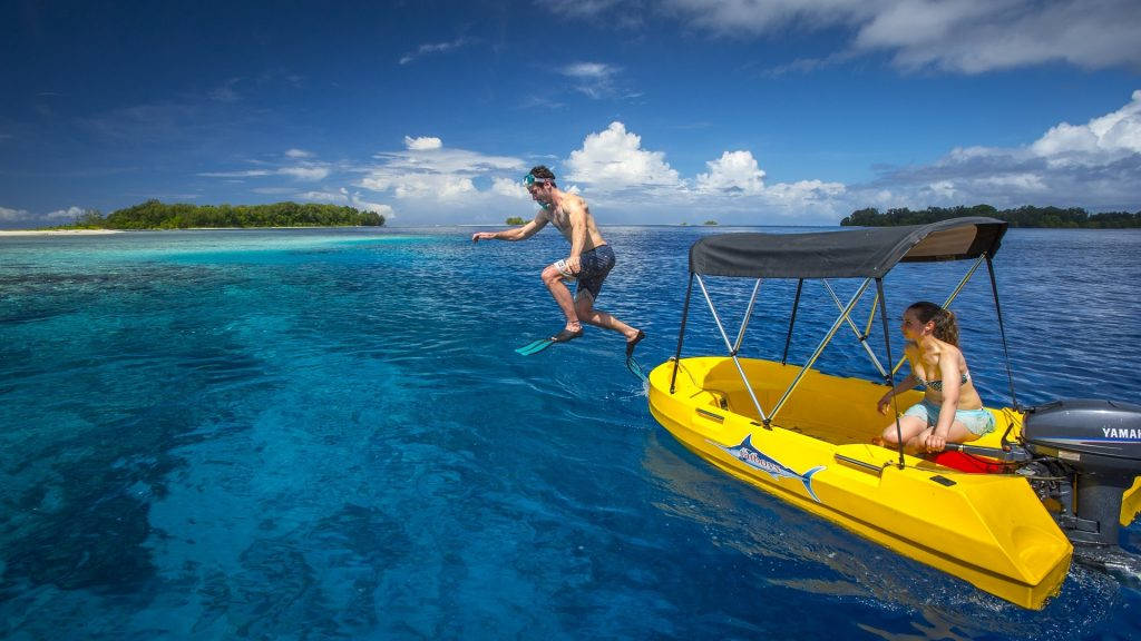 Solomon Islands Jumping In Sea Background