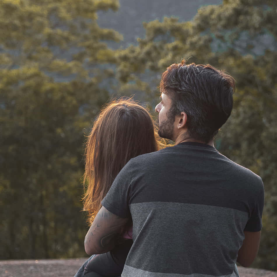 Somatic Man Holding Girl Background