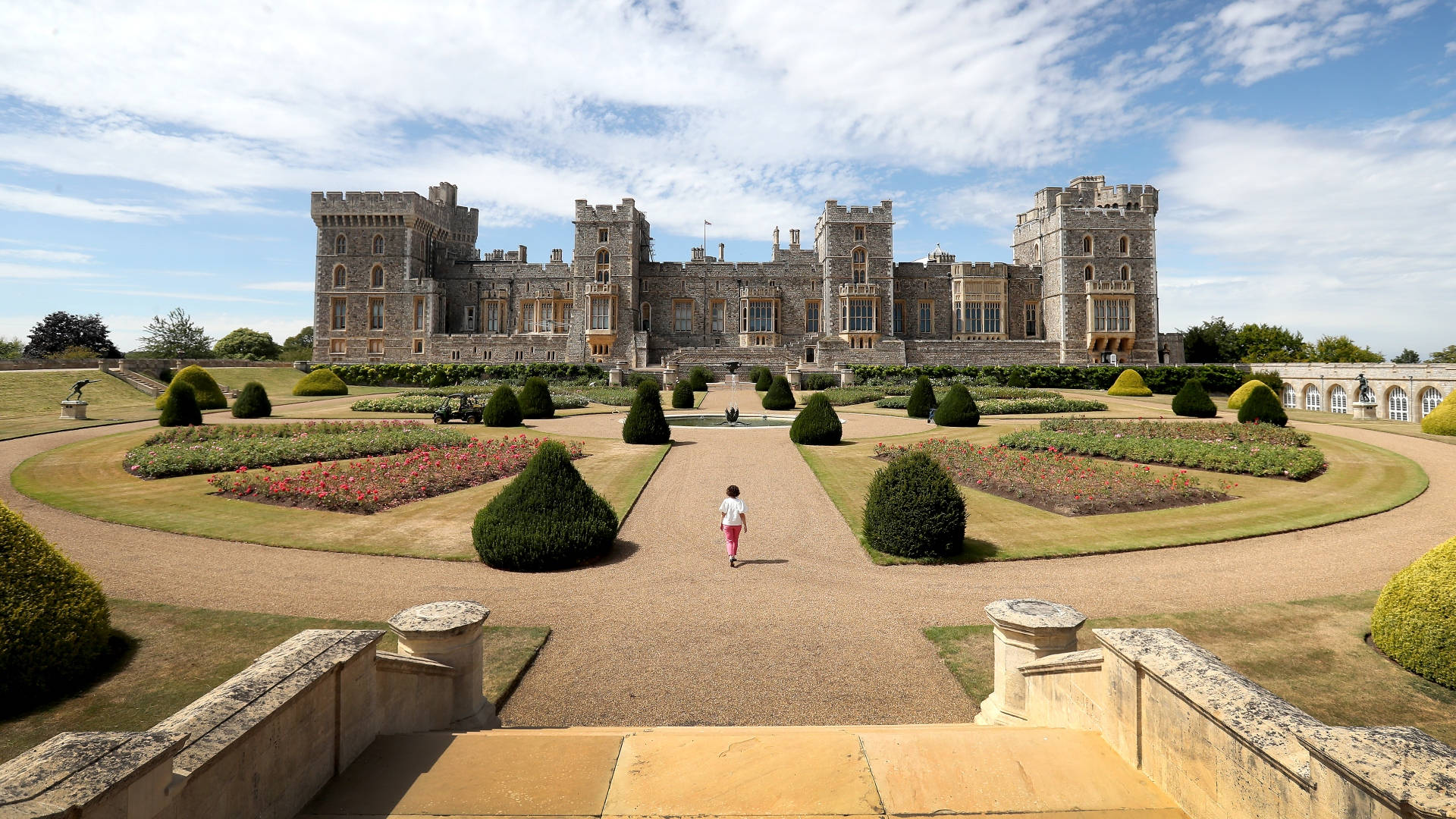 Someone Walking In Windsor Castle Garden Background