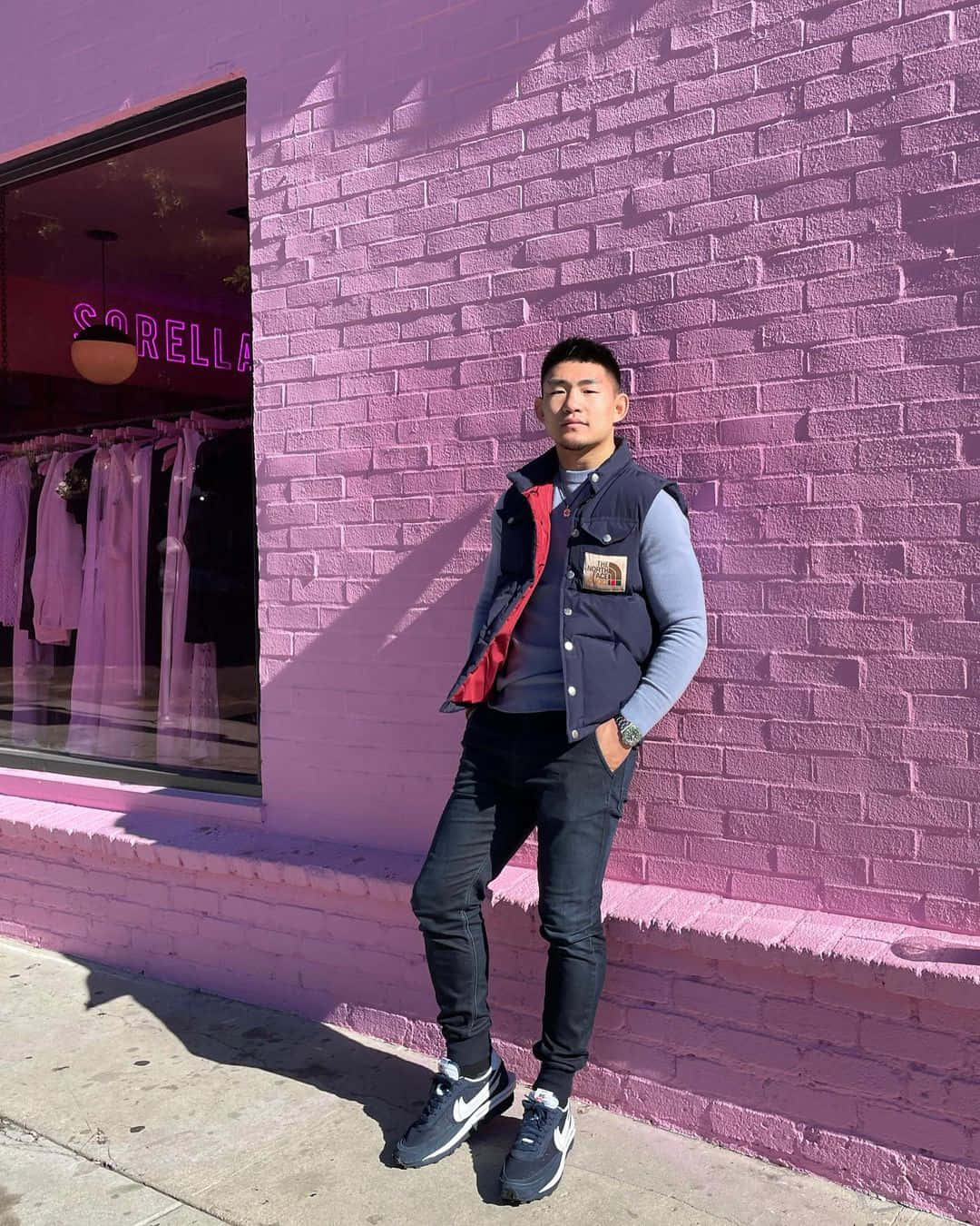 Song Yadong Outside A Shop In La Background