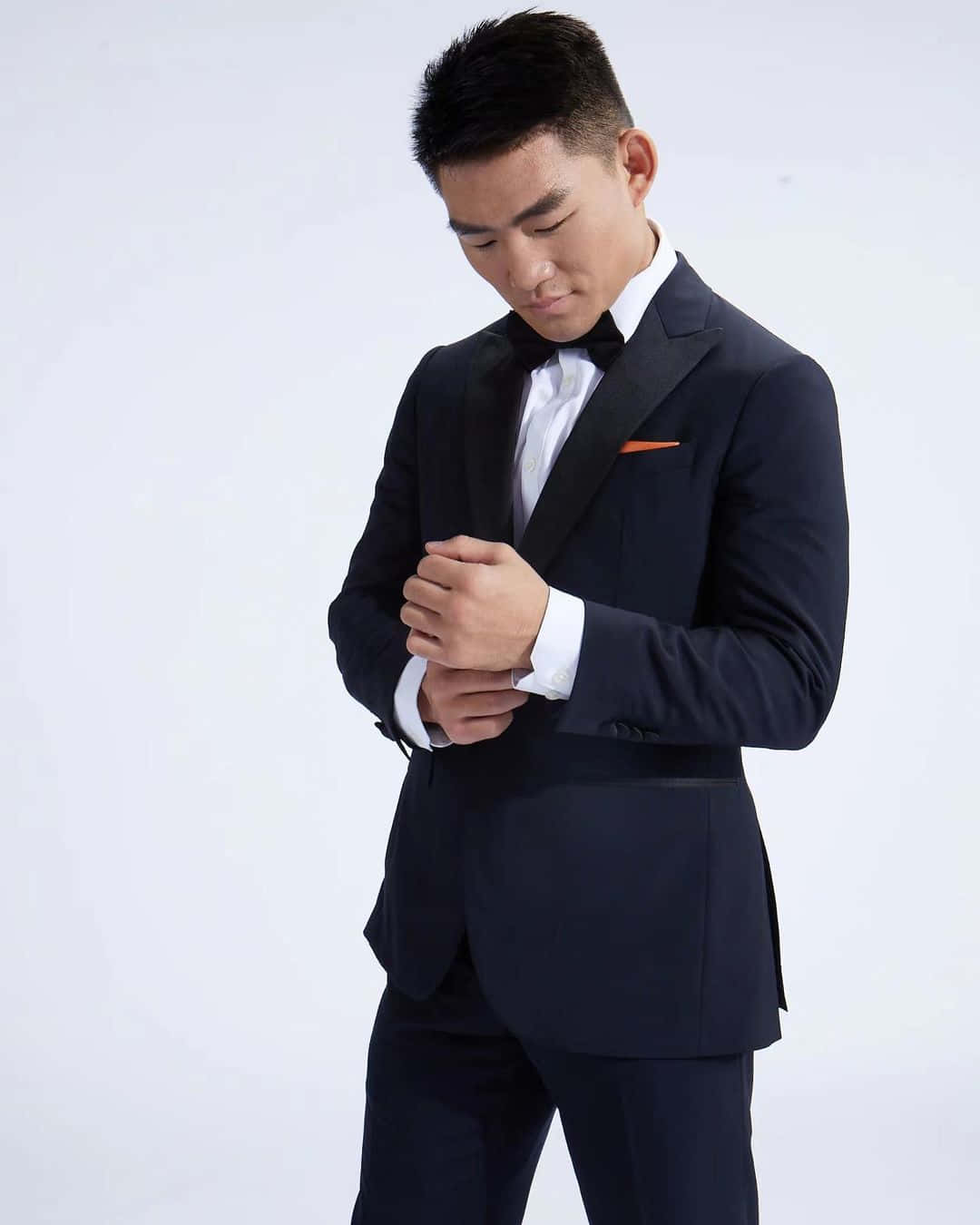 Song Yadong Wearing A Suit Background