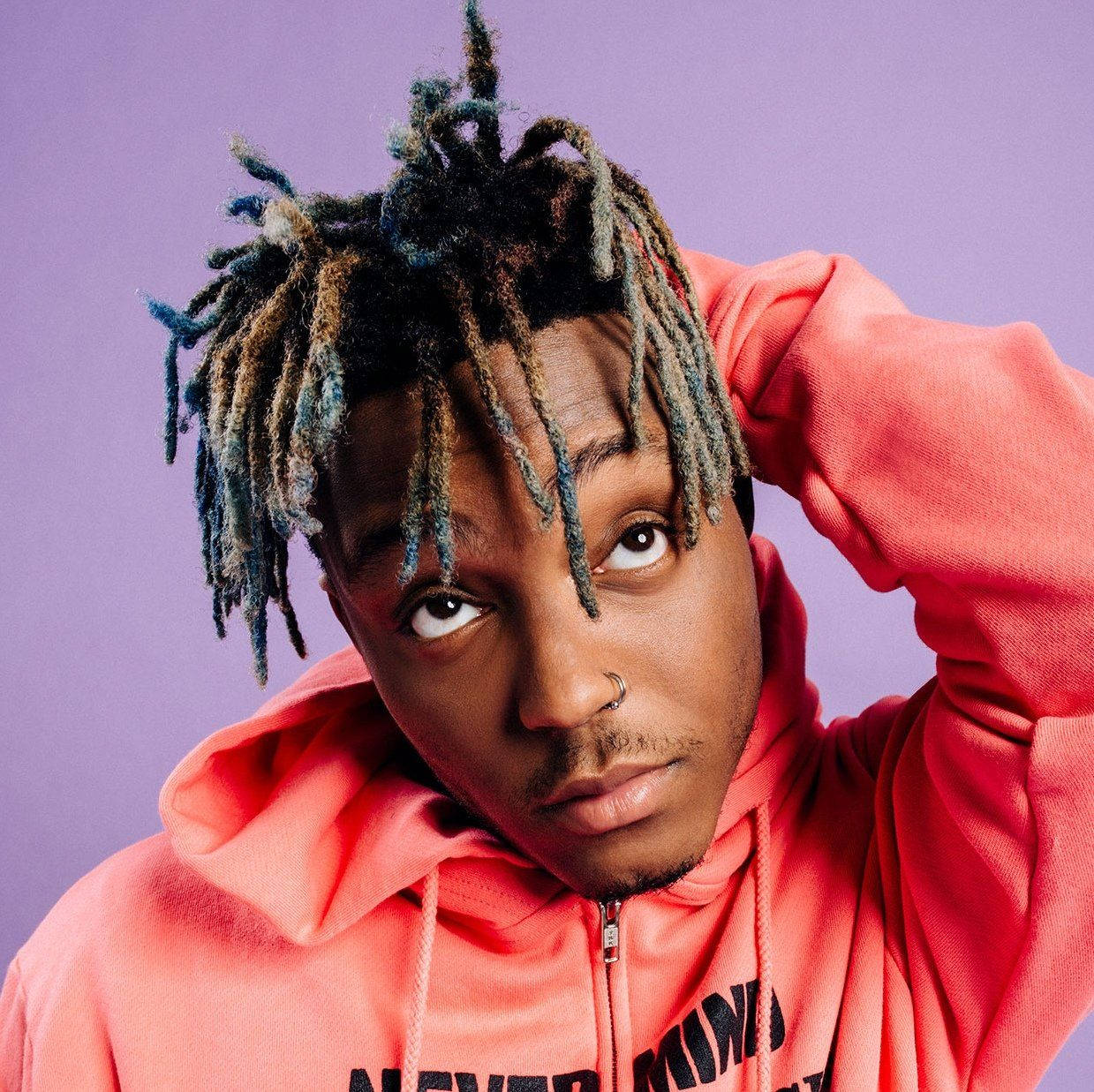 Songwriter Juice Wrld 999 In Pink Background
