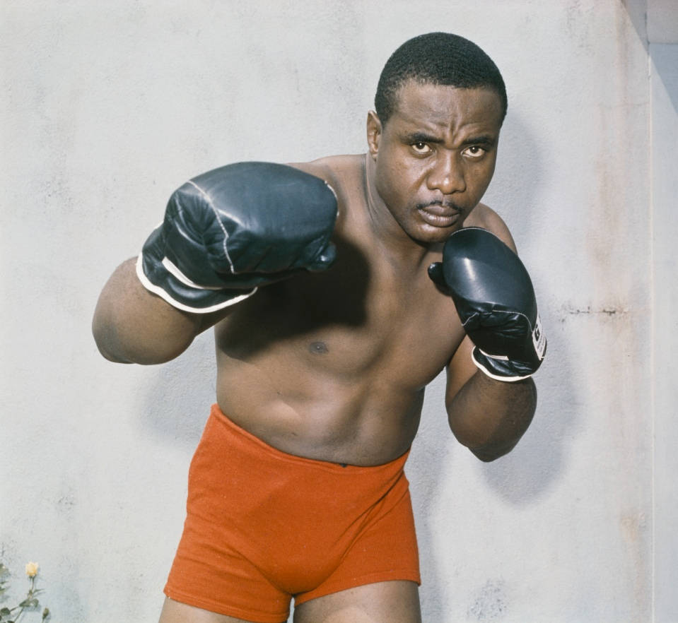 Sonny Liston Orange Boxers Background