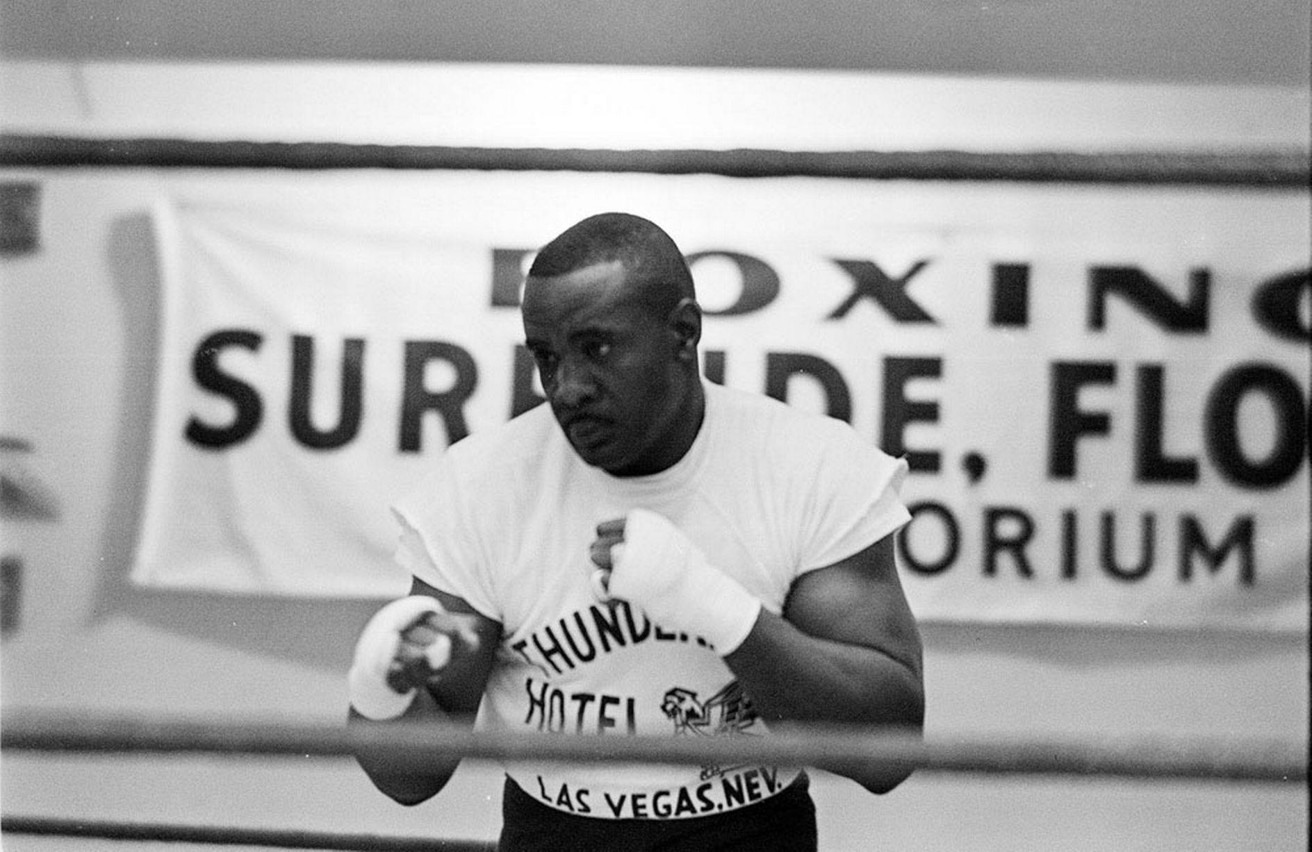 Sonny Liston Wearing Hand Wraps Background