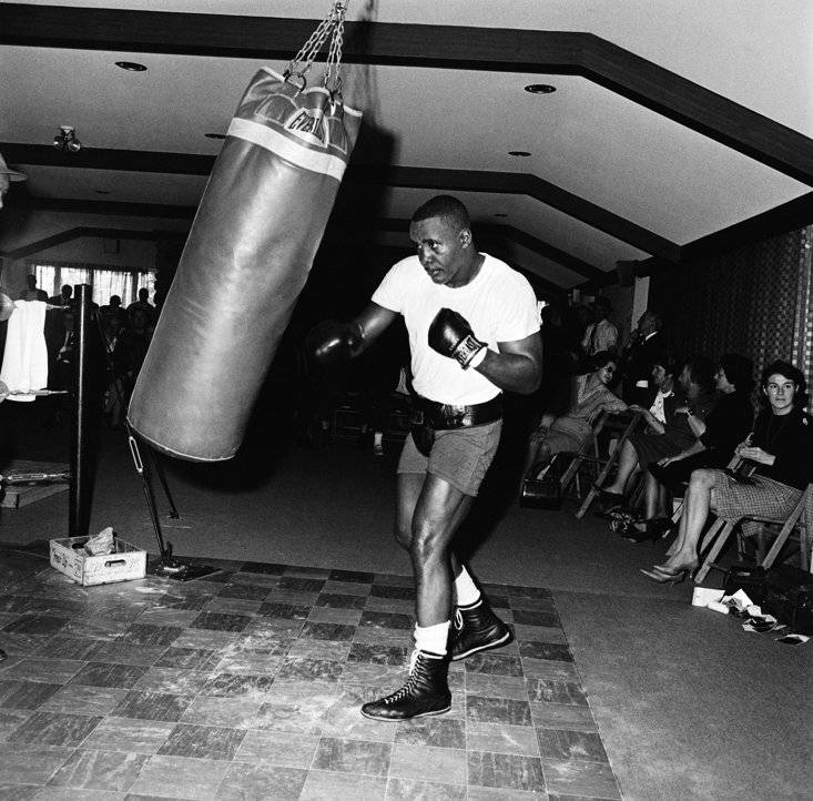 Sonny Liston With Punching Bag Background