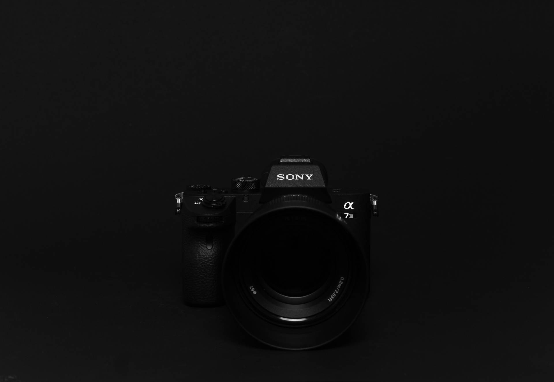 Sony Dslr Camera On Black Desktop Background