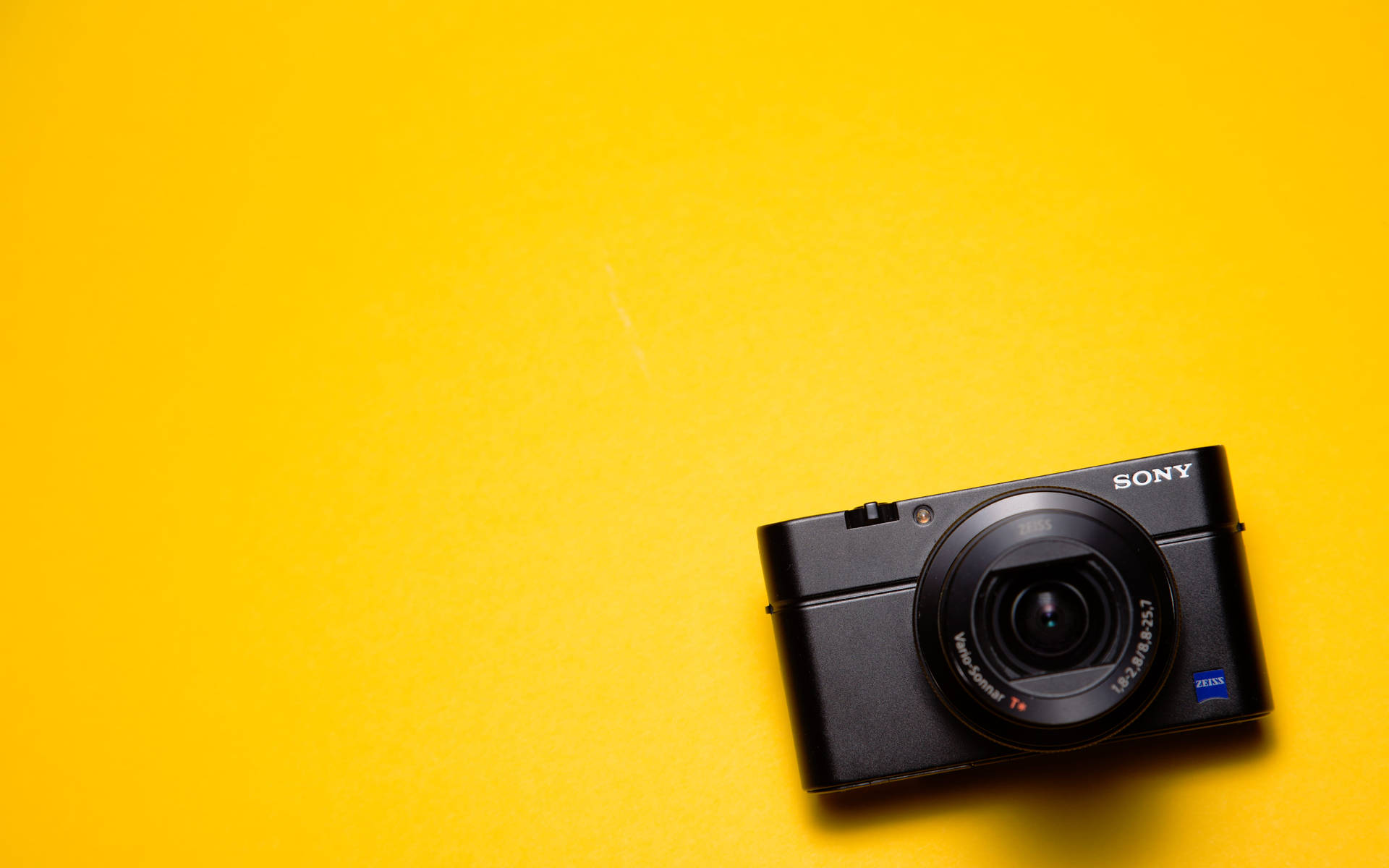 Sony Dslr Camera On Yellow Background